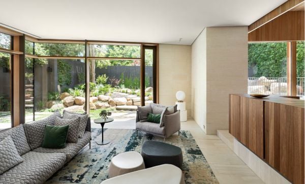 Book cover of Future Homes: Sustainable Innovative Designs, with a flat roof residential home with ornamental grasses. Published by Images Publishing.