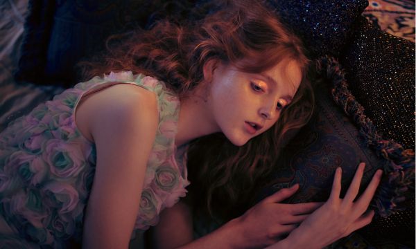 Book cover of Flower Shower, with a nude figure lying in a field of daisies. Published by Images Publishing.