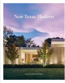 Modern residential home with flat roof, landscaped grounds, under purple sky, New Texas Modern, in white font above.