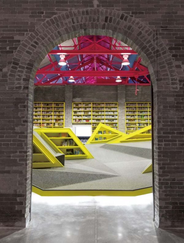 Book cover of Contemporary Creative Spaces for Children, featuring two boys playing on suspended multicolored webbing. Published by Images Publishing.