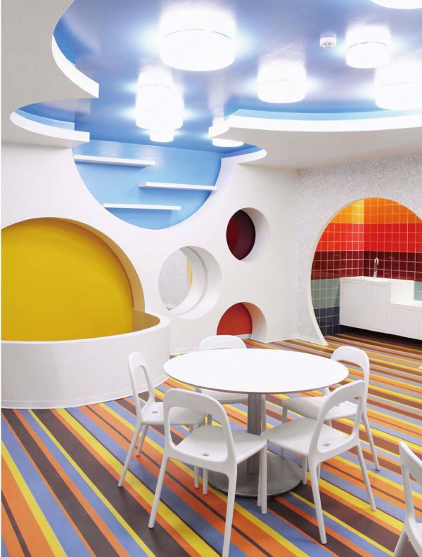 Book cover of Contemporary Creative Spaces for Children, featuring two boys playing on suspended multicolored webbing. Published by Images Publishing.