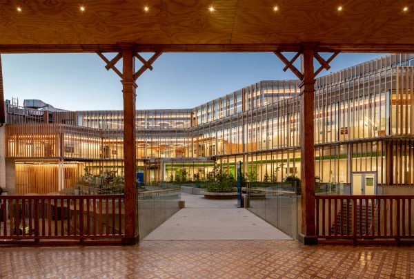 Book cover of Expect the Unexpected: luis vidal + architects, with part of the red structure of the Boston Logan International Airport Terminal E. Published by Images Publishing.