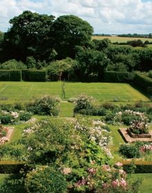 Book cover of Gertrude Jekyll: Her Art Restored at Upton Grey, featuring an aerial view of Arts and Crafts–style Manor house and formal gardens. Published by ACC Art Books.