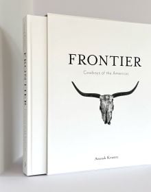 Book cover of Anouk Masson Krantz’s Frontier: Cowboys of the Americas, with a horned animal skull. Published by Images Publishing.