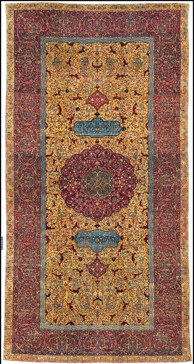 Book cover of The Persian Carpet Tradition, Six Centuries of Design Evolution, with a red and blue medallion design carpet design. Published by Hali Publications.