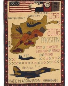Montage of colourful pattered rugs, on white cover of 'The Handmade Carpet, A Comprehensive Guide to Contemporary Rugs', by Hali Publications.