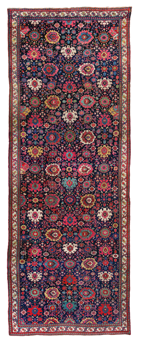 Bold Persian carpet design, with red and orange diamond shapes, black filter over top half, The Persian Carpet in bronze font to upper right.