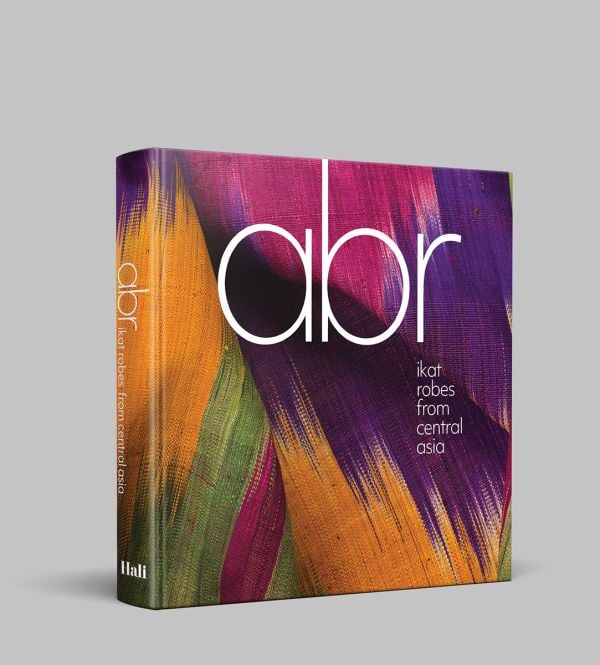 Book cover of Abr: Ikat Robes from Central Asia; featuring a colorful fabric. Published by Hali Publications.