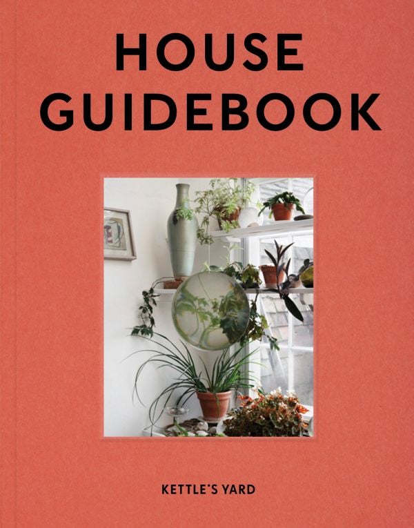 Book cover of Kettle's Yard House Guidebook; with a painting of green foliage on a circular canvas, surrounded by a collection of indoor plants. Published by Kettle's Yard, University of Cambridge.