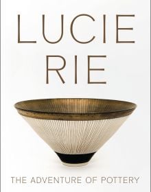 Thrown porcelain with Manganese glaze and sgraffito decoration, on white cover of 'Lucie Rie: The Adventure of Pottery', by Kettle's Yard.