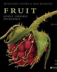 Book cover of Fruit: Edible, Inedible, Incredible, with close-up of raspberry. Published by Papadakis.