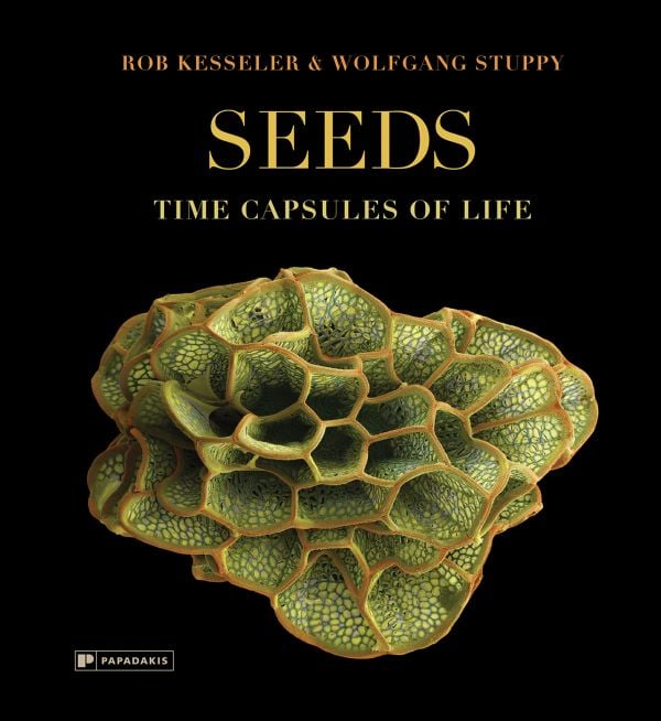 Book cover of Seeds: Time Capsules of Life, with a macro photo of seed case. Published by Papadakis.