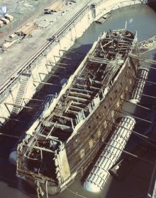 Book cover of Emma Hocker's Preserving Vasa, with an aerial view of a wooden ship in a museum. Published by Archetype Publications.