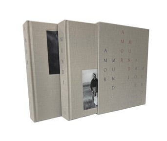 2 cream books, side by side, book mark ribbons poking out below, 2 black and white photos on front of each