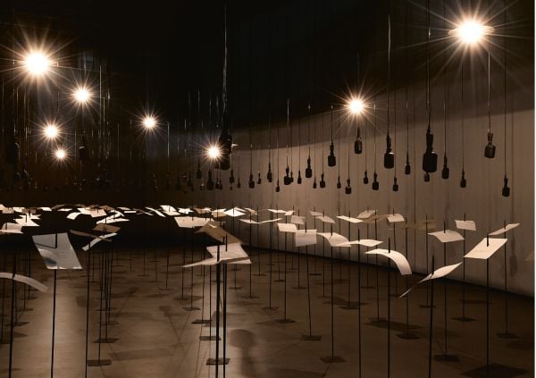 Artist Shilpa Gupta's sound installation exhibition featuring a tall metal spike on wood plinth.