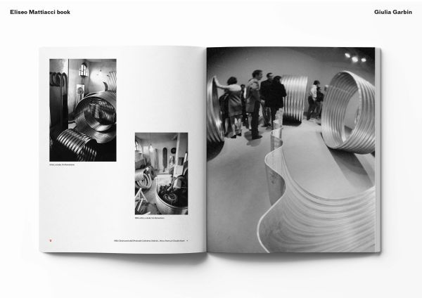 Book cover of Sculpture in Action Eliseo Mattiacci in Rome, with the Italian sculptor Eliseo Mattiacci assembling large installation sculpture on wall. Published by Ridinghouse.