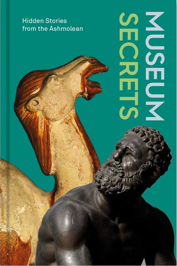 Book cover of Museum Secrets, Hidden Stories from the Ashmolean', with a bronze figure of male, and horse statue. Published by Ashmolean Museum.