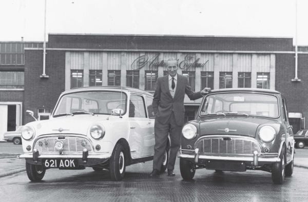 Book cover of The Age of Combustion, Notes on Automobile Design, featuring a close up of duel rear lights of blue Cadillac. Published by Circa Press.
