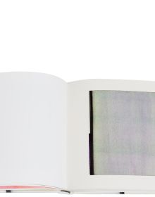 Vertical bleeding black paint line to centre of cream cover of 'Callum Innes – a pure land', by Circa Press.