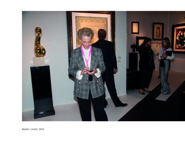 Group of women looking at their mobile phones, their faces illuminated, on cover of 'Screen Time', by Circa Press.