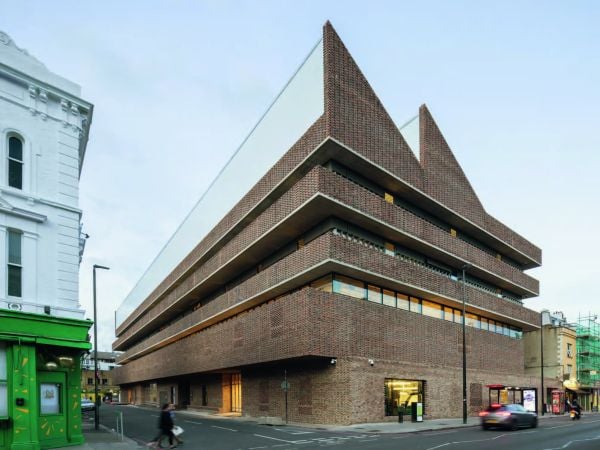 Book cover of Herzog & de Meuron, with a curved shaped interior of building. Published by Royal Academy of Arts.