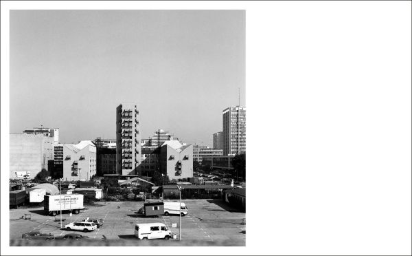 Dark blue cover with black and white low angled photo of structure with Light Lines in small grey font to top left