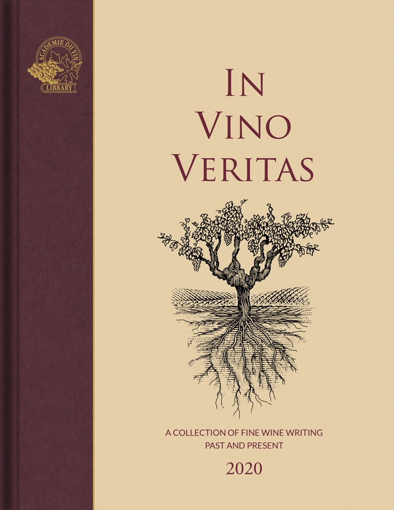 Black image of vine tree with roots burrowing into ground and In Vino Veritas in dark red font above on beige cover