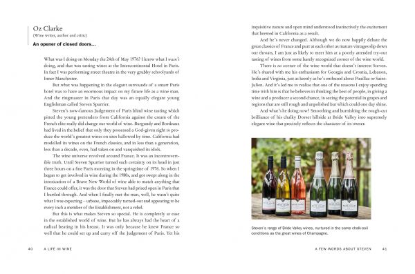 Book cover of Steven Spurrier, A Life in Wine, with the British wine expert and merchant sitting in chair, holding glass of wine, surrounded by stacks of wine. Published by Academie du Vin Library.