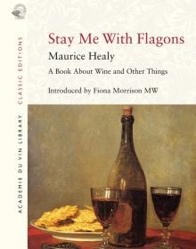 Book cover of Stay Me with Flagons, featuring a painting of wine bottle, two glasses of red wine and a plate of yellow crackers on table. Published by Academie du Vin Library.