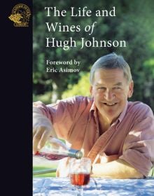 Book cover of The Life and Wines of Hugh Johnson, featuring Hugh Johnson pouring a glass of rose wine. Published by Academie du Vin Library.