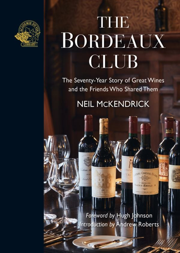 Book cover of The Bordeaux Club, The convivial adventures of 12 friends and the world's finest wine, with bottles of vintage red wine on table, with wine glasses. Published by Academie du Vin Library.