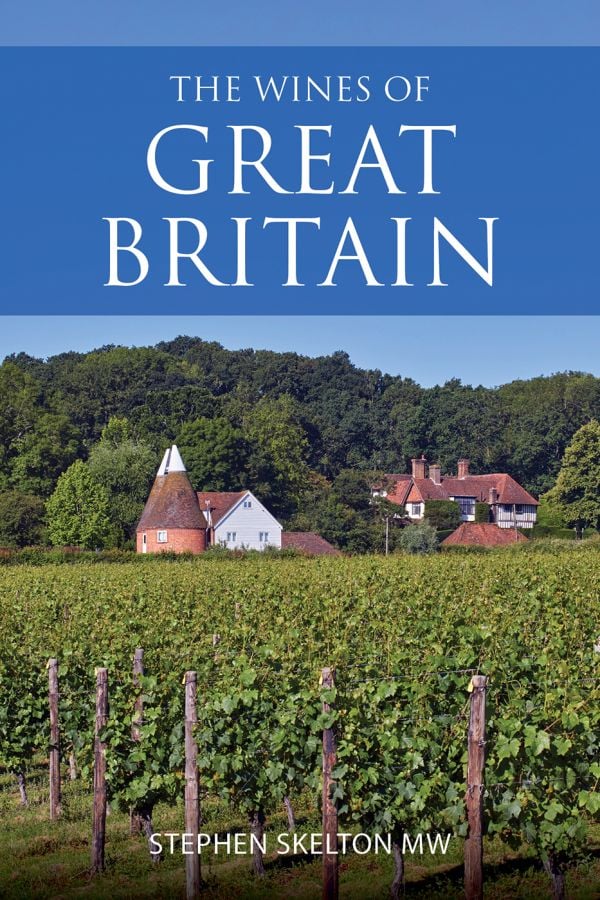 Book cover of Stephen Skelton's guide, The Wines of Great Britain, with the Oast House Meadow vineyard of Hush Heath Estate, Kent, under bright blue sky. Published by Academie du Vin Library.