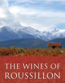 Book cover of Rosemary George's guide, The Wines of Roussillon, with vineyards and mountains behind. Published by Academie du Vin.