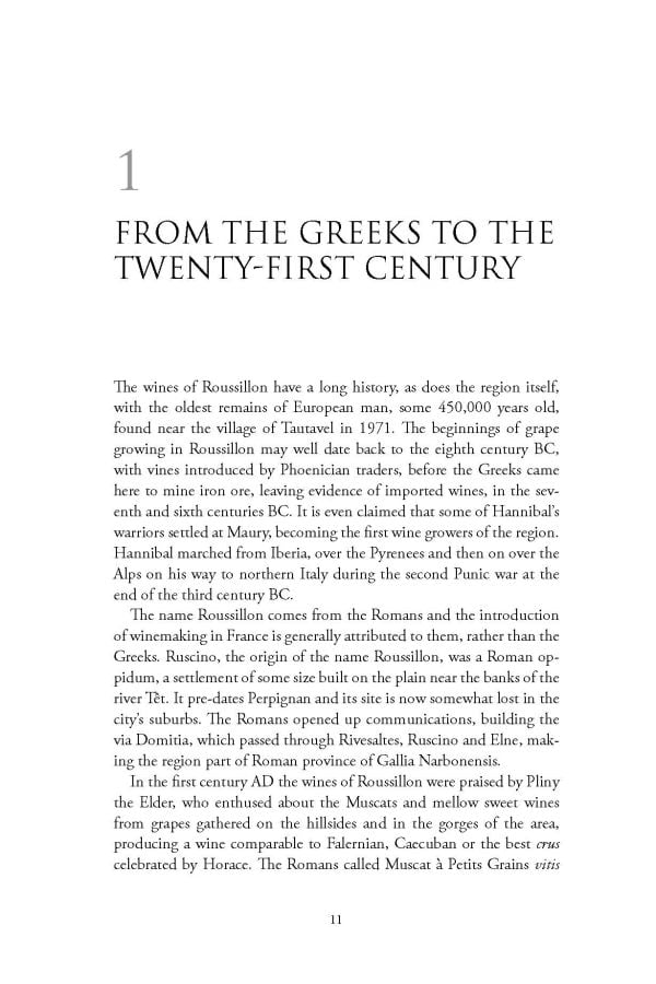 Book cover of Rosemary George's guide, The Wines of Roussillon, with vineyards and mountains behind. Published by Academie du Vin.