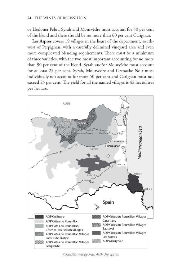 Book cover of Rosemary George's guide, The Wines of Roussillon, with vineyards and mountains behind. Published by Academie du Vin.