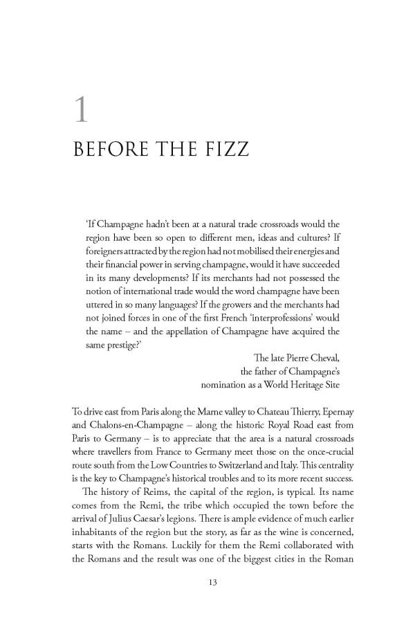 Book cover of Nicholas Faith's guide, The Story of Champagne, with a view a vineyards and roof tops in the distance. Published by Academie du Vin Library.