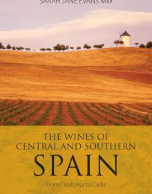 Book cover of Sarah Jane Evans's guide, The Wines of Central and Southern Spain, with rolling golden hills and a vineyard. Published by Academie du Vin Library.
