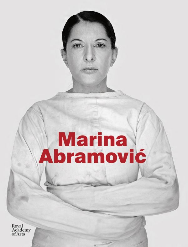 Art catalogue cover of Marina Abramovi?, Dutch Edition, featuring the Serbian artist in a straight-jacket, staring sternly at the viewer. Published by Royal Academy of Arts.