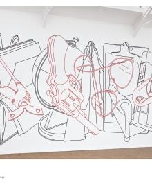 Book cover of Michael Craig-Martin, with a painting of green electric guitar behind red bench seat. Published by Royal Academy of Arts.