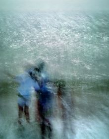 Pale blue and white blurred abstract photograph of figure in sea, on cover of 'Lightstream', by Lost Press.