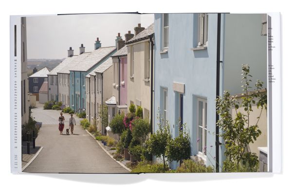 Book cover of Clive Aslet's Living Tradition: The Architecture and Urbanism of Hugh Petter, with building with a stone façade. Published by Triglyph Books.