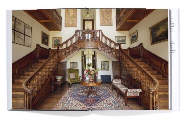 Book cover of Clive Aslet's Living Tradition: The Architecture and Urbanism of Hugh Petter, with building with a stone façade. Published by Triglyph Books.