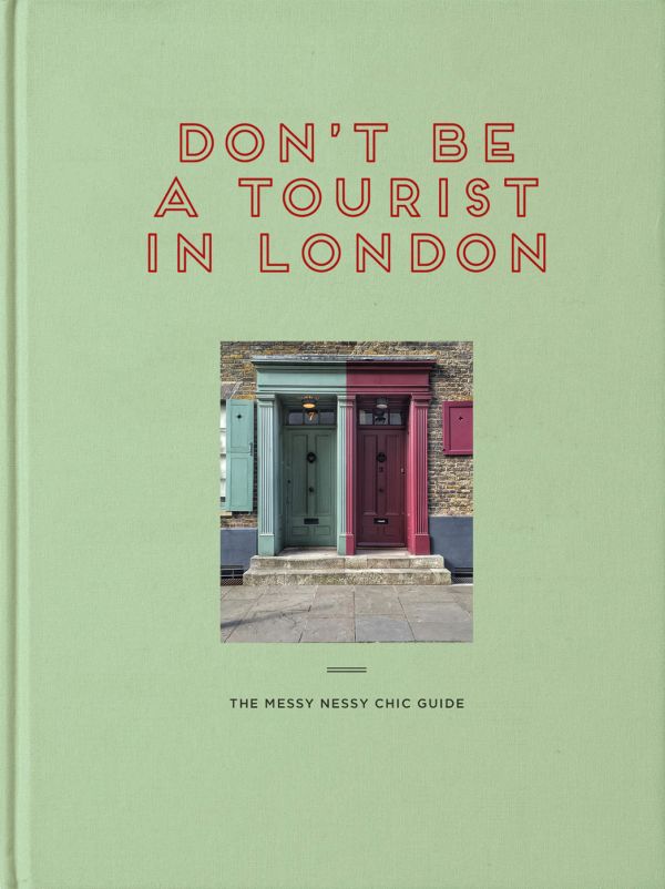 Book cover of Vanessa Grall's Don’t be a Tourist in London, with two entrance doors. Published by 13 Things Ltd.