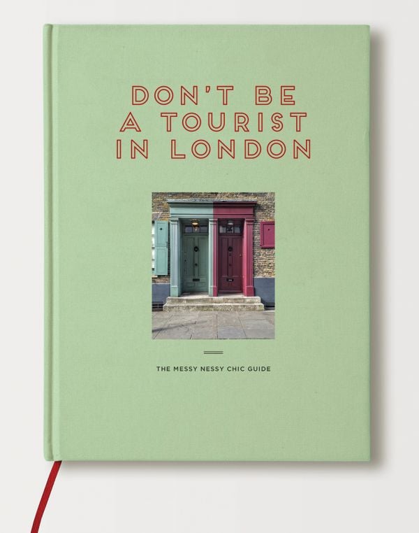 Book cover of Vanessa Grall's Don’t be a Tourist in London, with two entrance doors. Published by 13 Things Ltd.