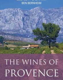 Book cover of The Wines of Provence; with a vineyard and mountains behind. Published by Academie du Vin Library.