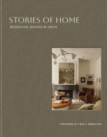 Book cover of Stories of Home: Residential Designs by Hacin; showcasing a modern living room with a fireplace, contemporary lighting, and warm-toned furnishings. Published by Images Publishing.