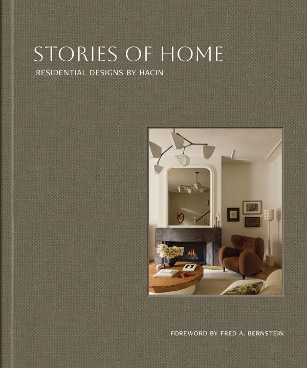 Book cover of Stories of Home: Residential Designs by Hacin; showcasing a modern living room with a fireplace, contemporary lighting, and warm-toned furnishings. Published by Images Publishing.