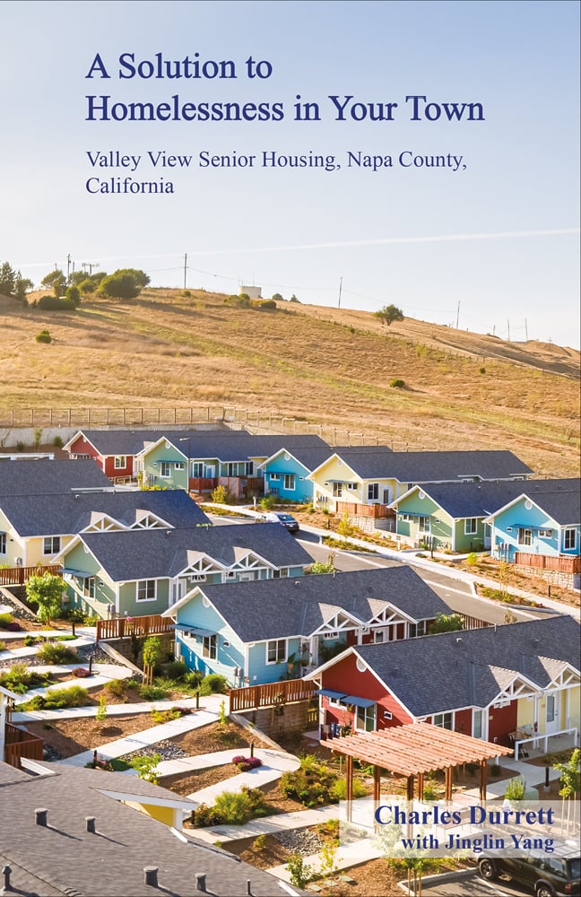 Urban housing estate surrounded by hilly landscape, A solution to homelessness in your town Valley View Senior Housing Napa County California in blue font above.