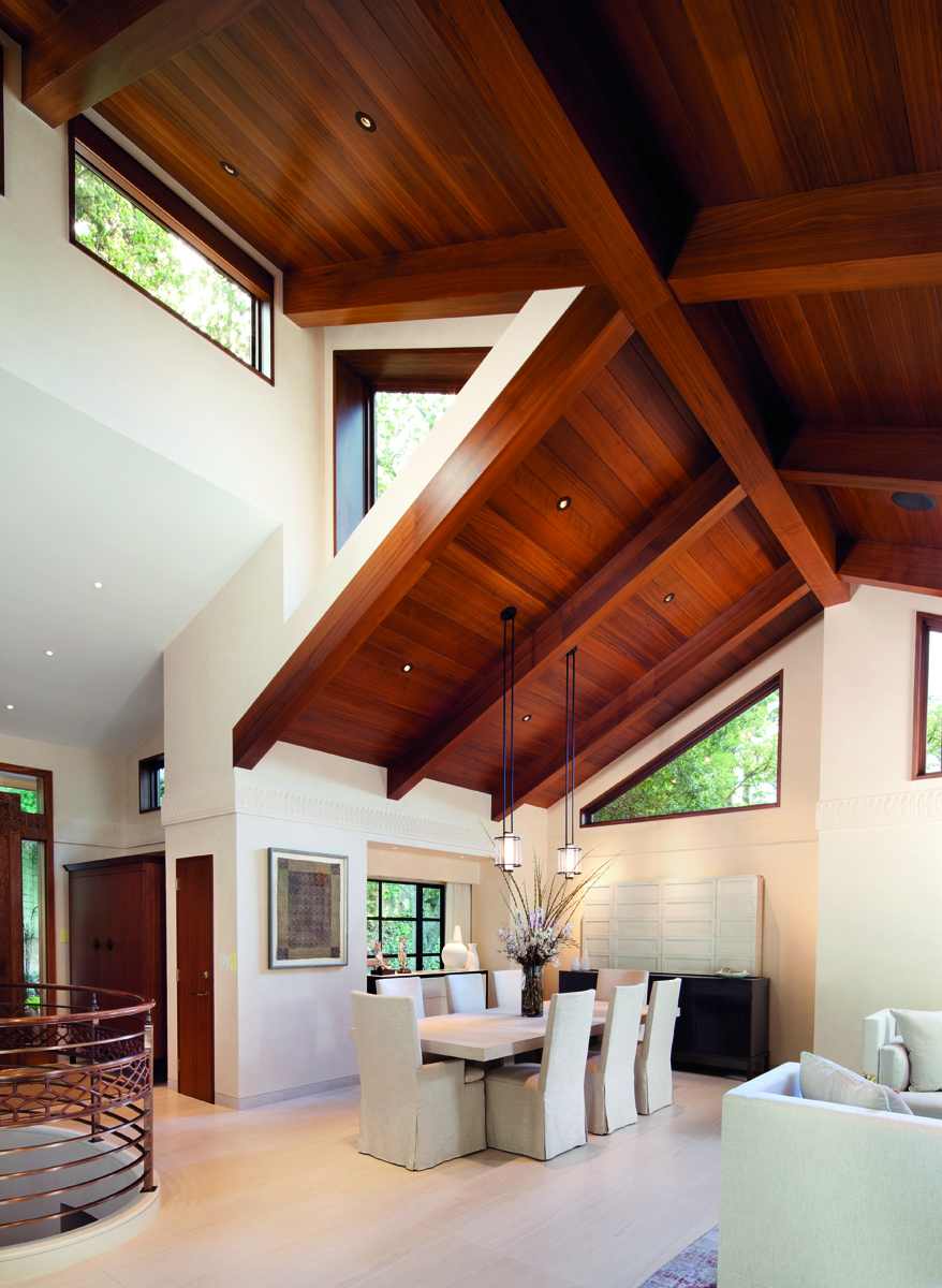 Single storey wood house with low steps leading to swimming pool, Pacific Modern in white font above