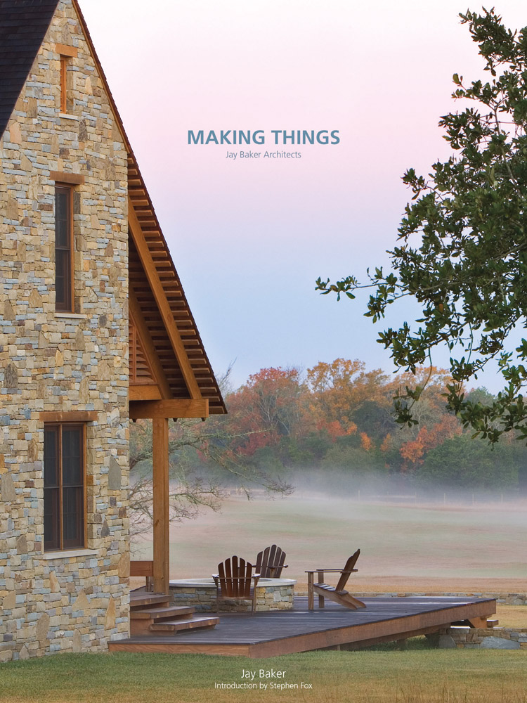Brick building, wood decking with Adirondack chairs, misty landscape, Making Things in pale grey above
